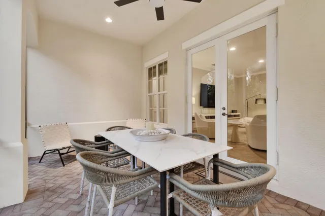a kitchen with a table and chairs