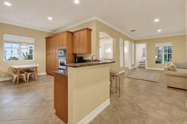 a living room filled with furniture and a table