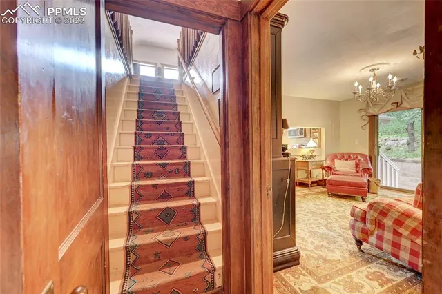 a en suite bathroom with a tub shower and a mirror