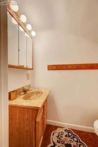 a bathroom with a sink and a toilet