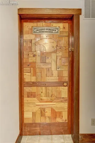 a view of walk in closet with empty tub