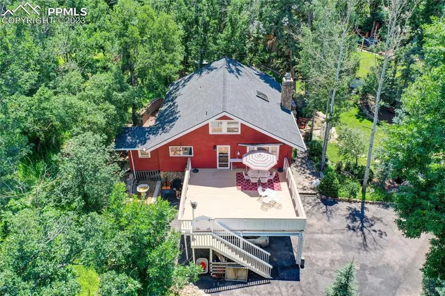 a view of house with a patio