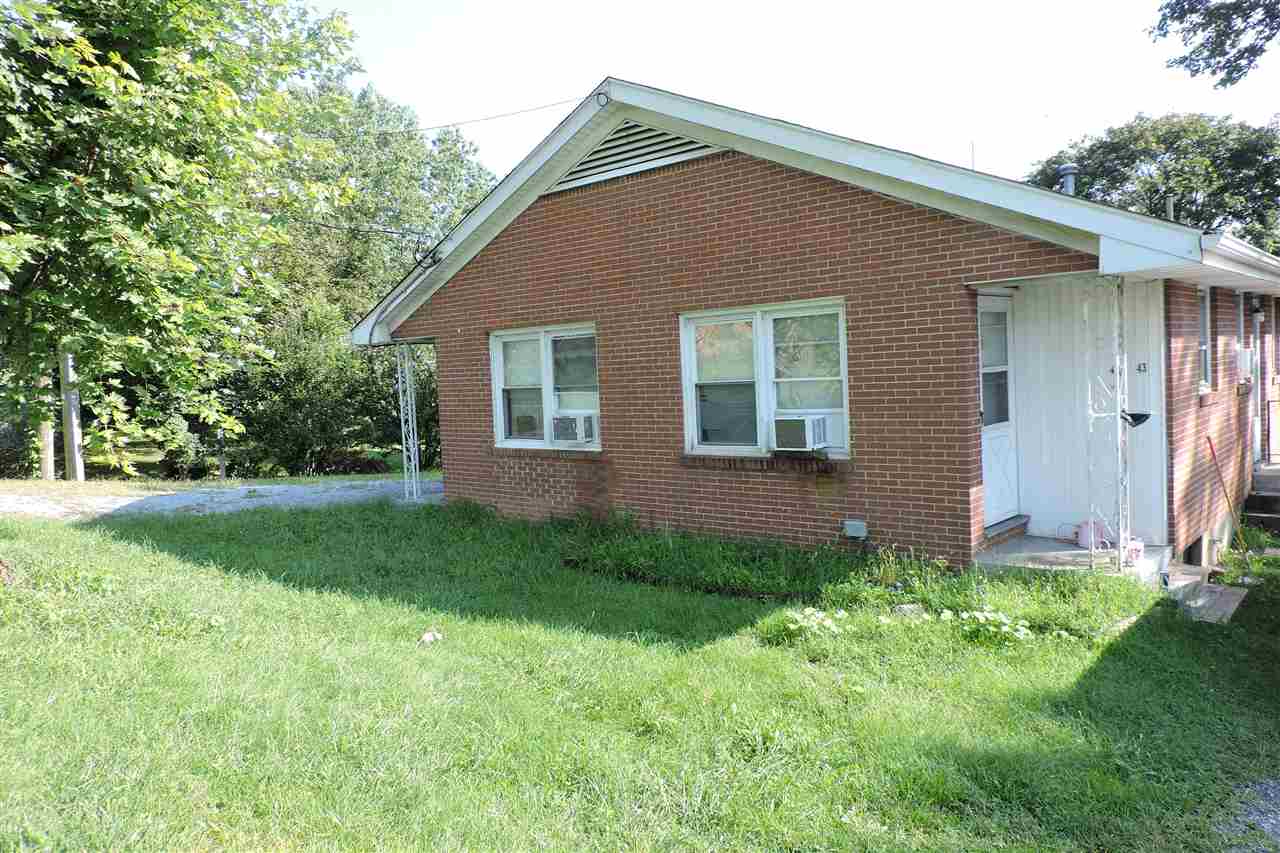 43 Quick's Mill Road, Unit 101&103 Verona, VA 24482 - Photo 5 of 14 a front view of house with yard and green space