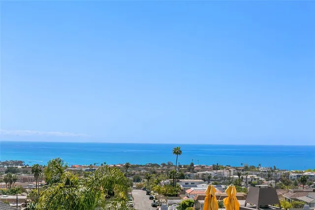 a view of a patio with a table and chairs