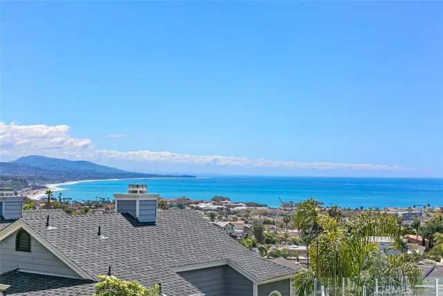 a view of an entryway with wooden floor and stairs