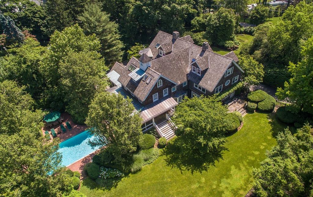 25 Garden Road Scarsdale, NY 10583 - Photo 1 of 1 an aerial view of a house with yard swimming pool and outdoor seating