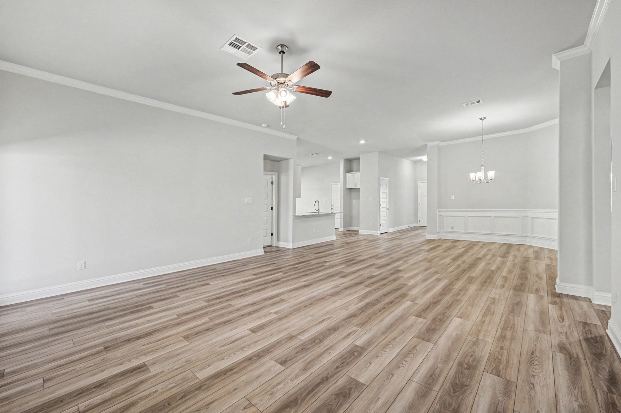 601 Greystone Lane Angleton, TX 77515 - Photo 7 of 32 a view of empty room with wooden floor and window