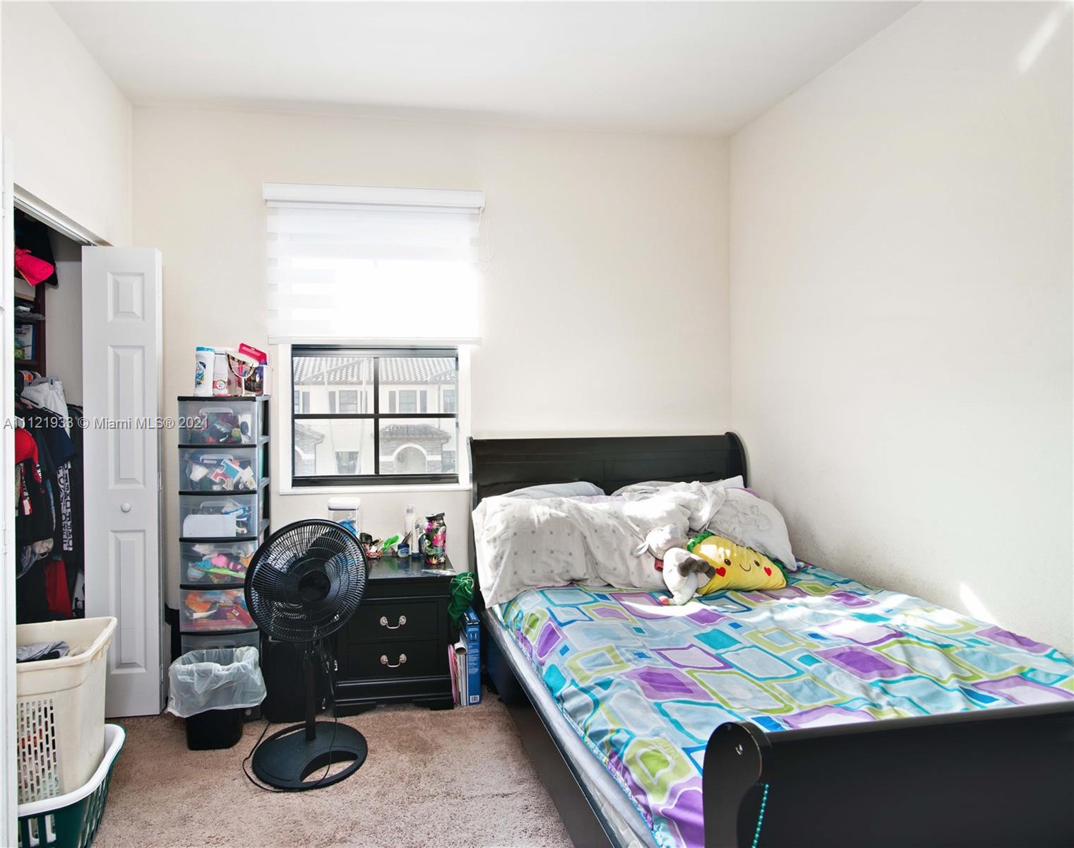 3213 Southeast 5th Court Homestead, FL 33033 - Photo 15 of 19 a bedroom with a bed and wooden floor