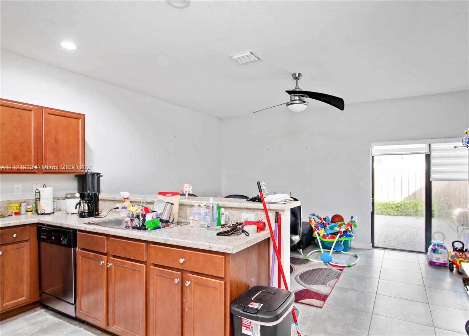 3213 Southeast 5th Court Homestead, FL 33033 - Photo 7 of 19 a view of a kitchen with appliances and workspace
