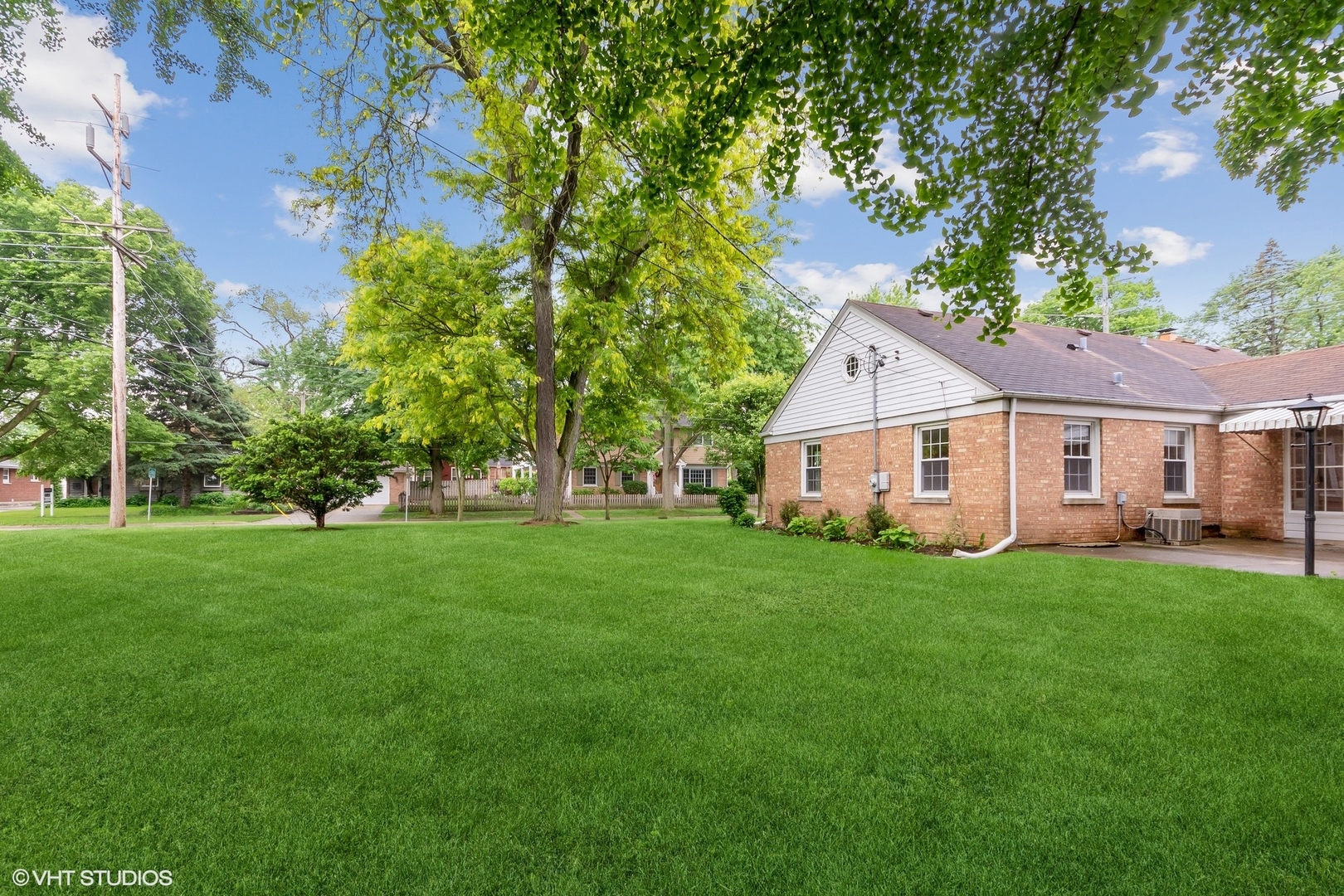 402 Berry Road Barrington, IL 60010 - Photo 19 of 22 a front view of a house with garden