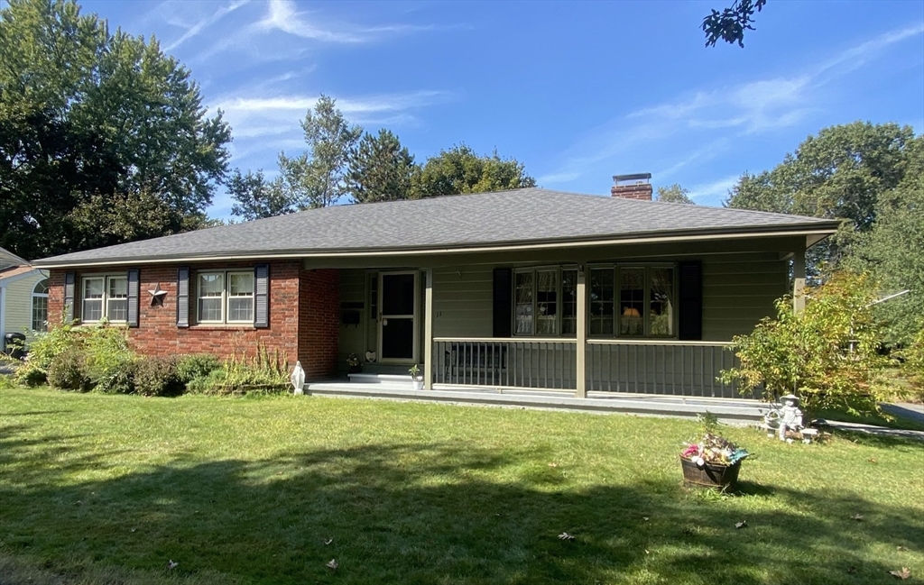 11 Highland Avenue Clinton, MA 01510 - Photo 1 of 25 a front view of a house with a yard