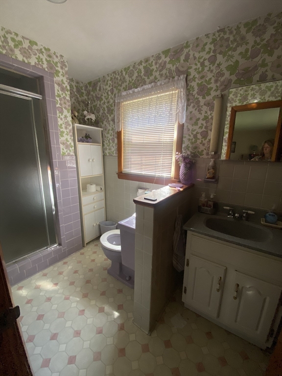 11 Highland Avenue Clinton, MA 01510 - Photo 12 of 25 a kitchen with stainless steel appliances granite countertop a stove a sink and a microwave