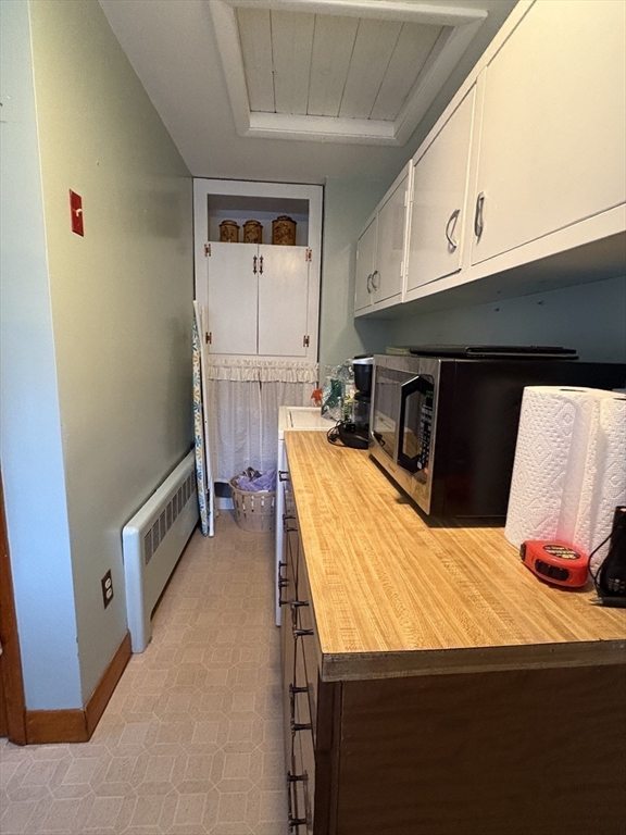 11 Highland Avenue Clinton, MA 01510 - Photo 16 of 25 a bedroom with a bed and a mirror