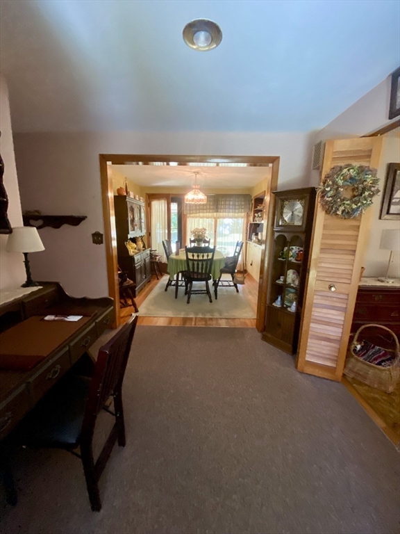 11 Highland Avenue Clinton, MA 01510 - Photo 6 of 25 a room with gym equipment and a large window