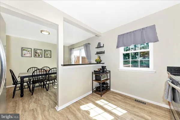 a view of a livingroom with furniture and window