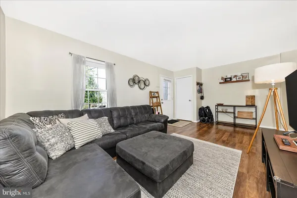 a living room with furniture and a couch