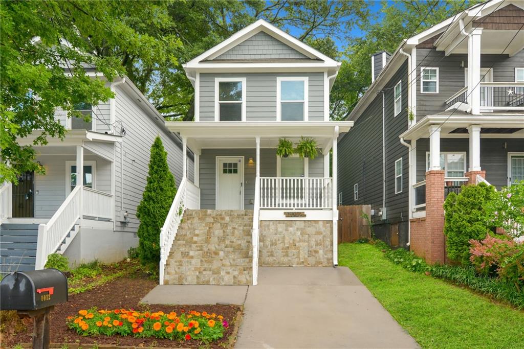 1012 McDaniel Street Southwest Atlanta, GA 30310 - Photo 1 of 1 front view of a house with a yard