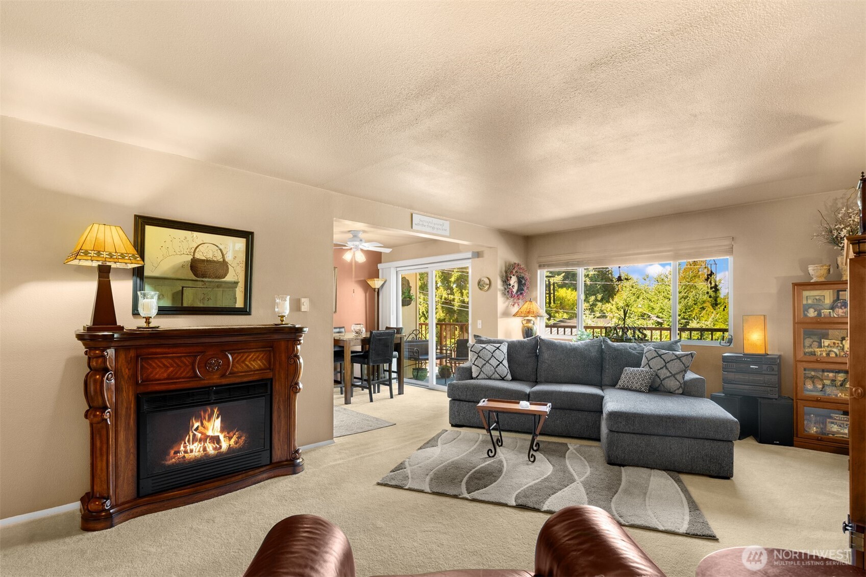 330 Elm Street, Unit 305 Everett, WA 98203 - Photo 1 of 25 a living room with furniture a window and a fireplace