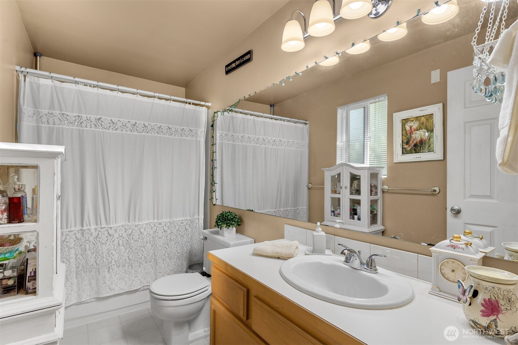 330 Elm Street, Unit 305 Everett, WA 98203 - Photo 11 of 25 a bathroom with a sink toilet and shower