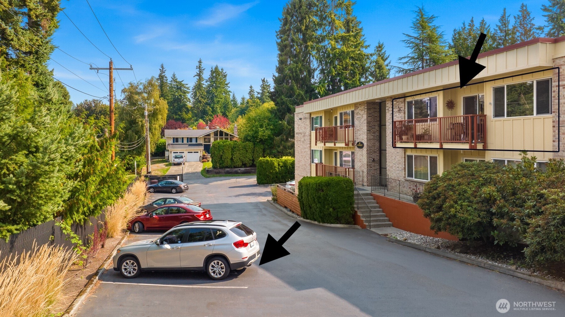 330 Elm Street, Unit 305 Everett, WA 98203 - Photo 20 of 25 a car parked in front of a house
