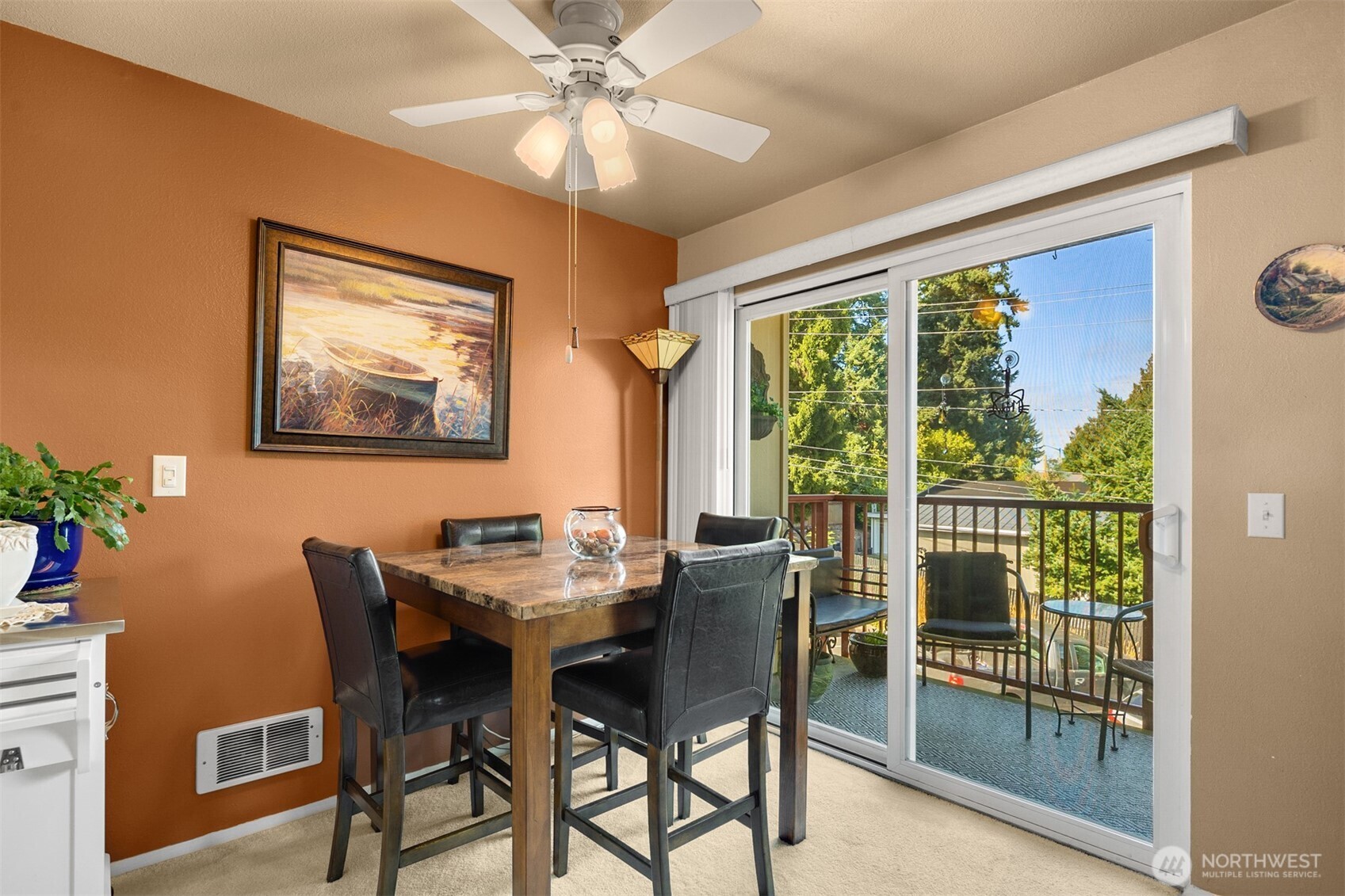 330 Elm Street, Unit 305 Everett, WA 98203 - Photo 4 of 25 a dining room with furniture a chandelier and window