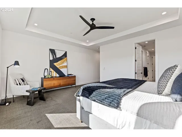 a bedroom with a bed and gym equipment