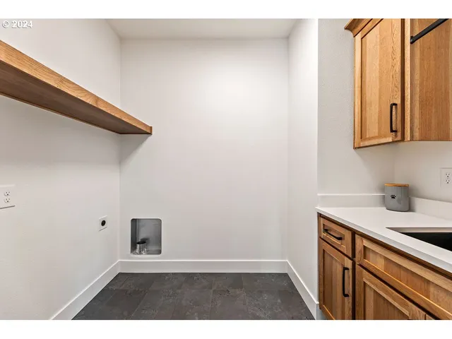 a view of cabinets with wooden floor