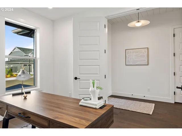 a view of a workspace with furniture