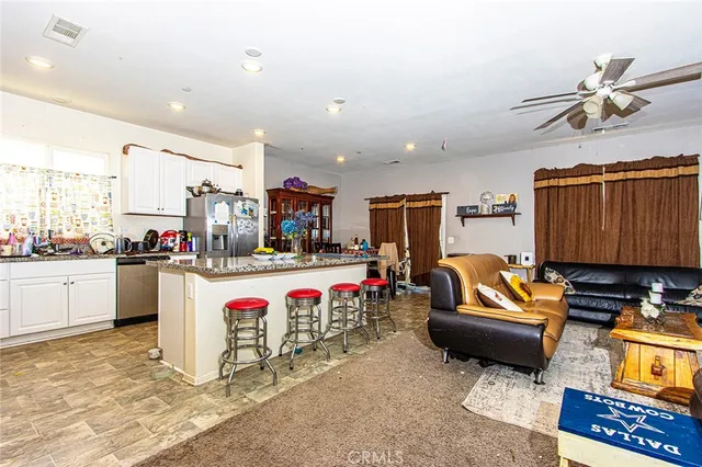 a swimming pool with outdoor seating