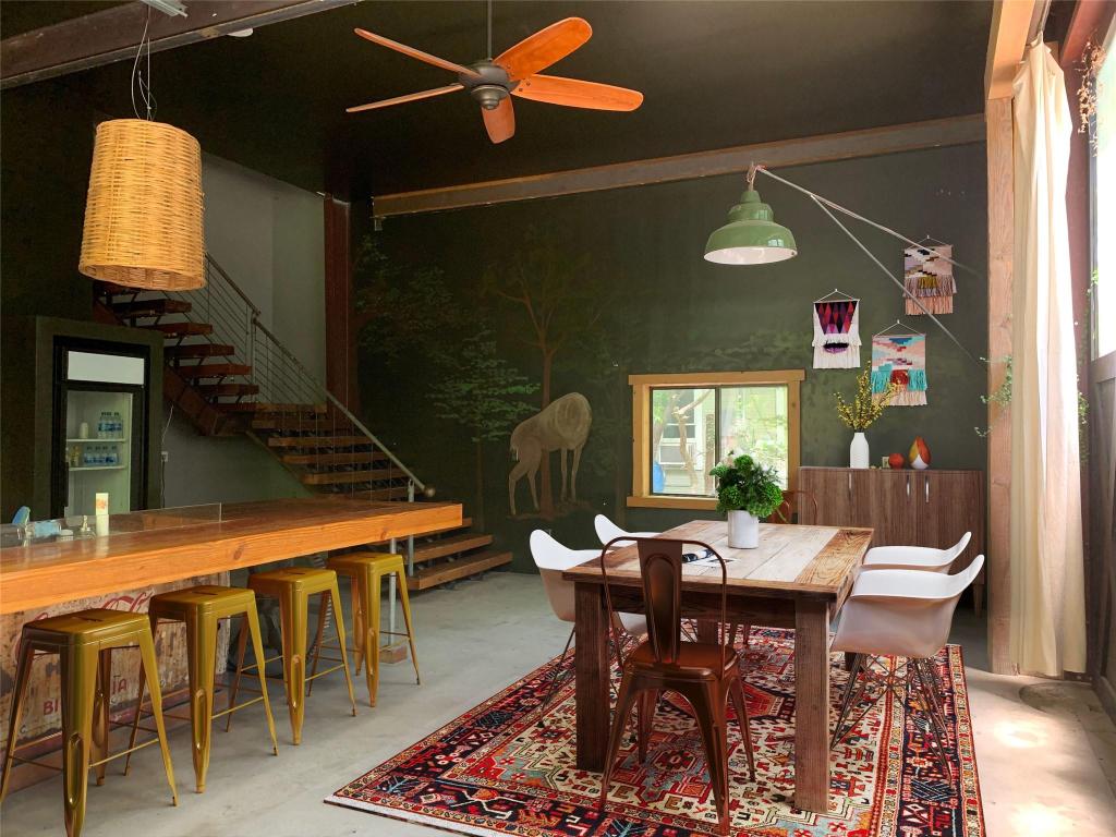 640 Tillery Street Austin, TX 78702 - Photo 4 of 22 a dining room with furniture window and wooden floor