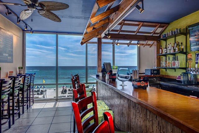 16819 Front Beach Road, Unit 3011 Panama City Beach, FL 32413 - Photo 25 of 28 a group of people sitting on a balcony