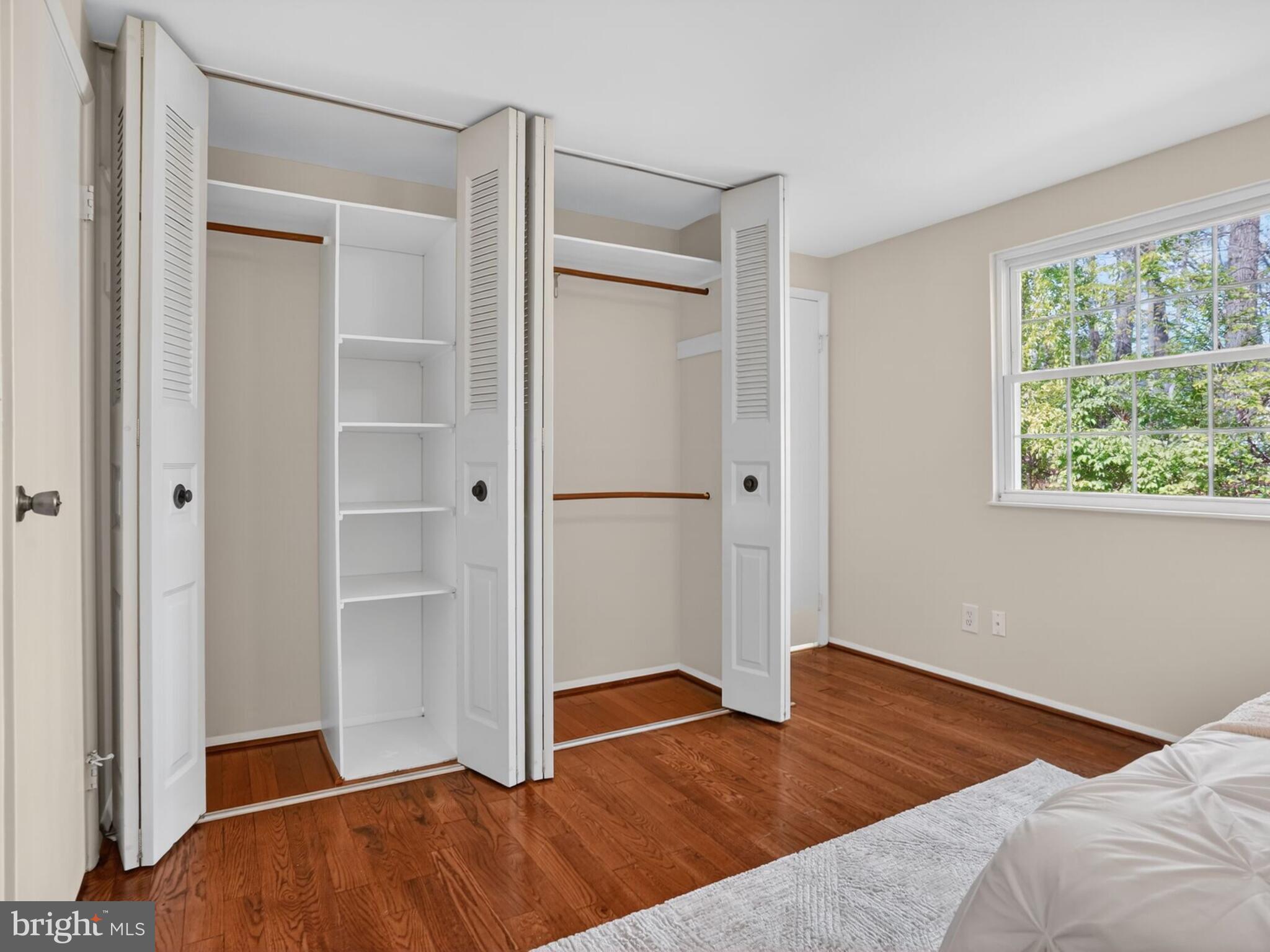 5914 Freds Oak Road Burke, VA 22015 - Photo 16 of 30 a bedroom with a bed and a window