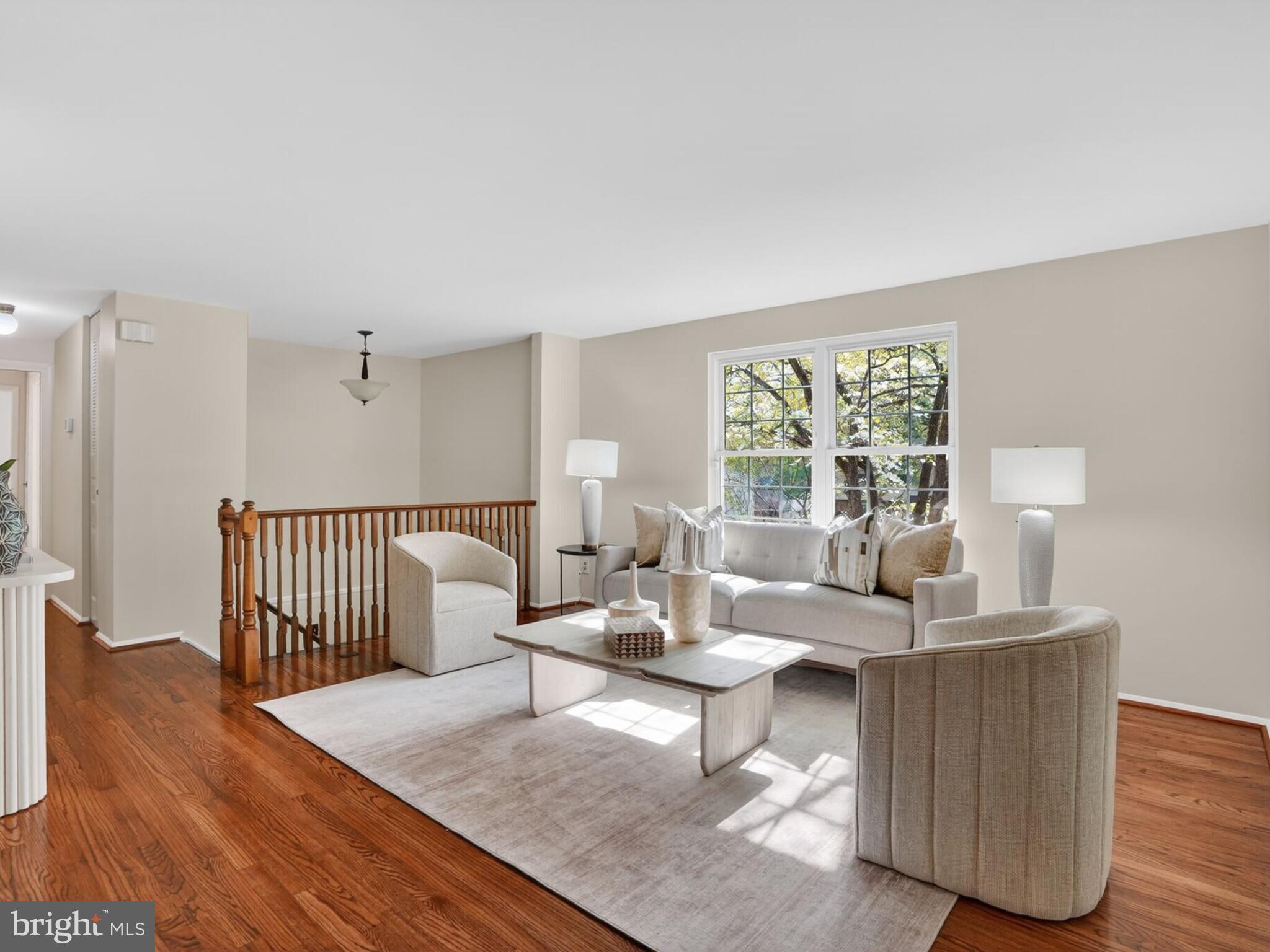 5914 Freds Oak Road Burke, VA 22015 - Photo 4 of 30 a living room with furniture and a window