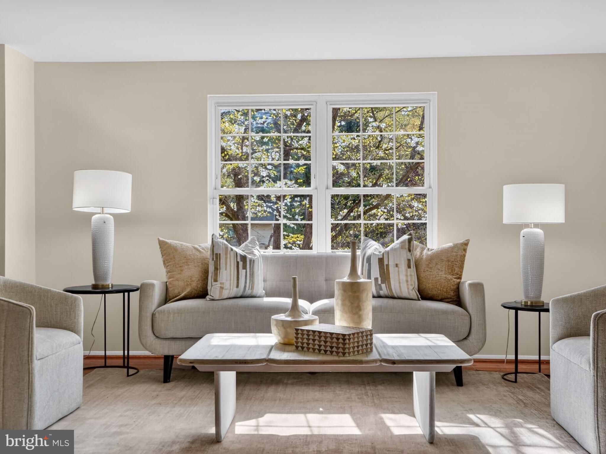 5914 Freds Oak Road Burke, VA 22015 - Photo 5 of 30 a living room with furniture a lamp and a table