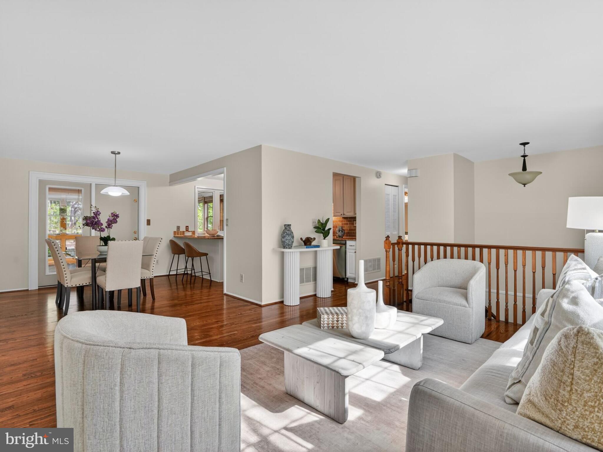 5914 Freds Oak Road Burke, VA 22015 - Photo 6 of 30 a living room with furniture and wooden floor