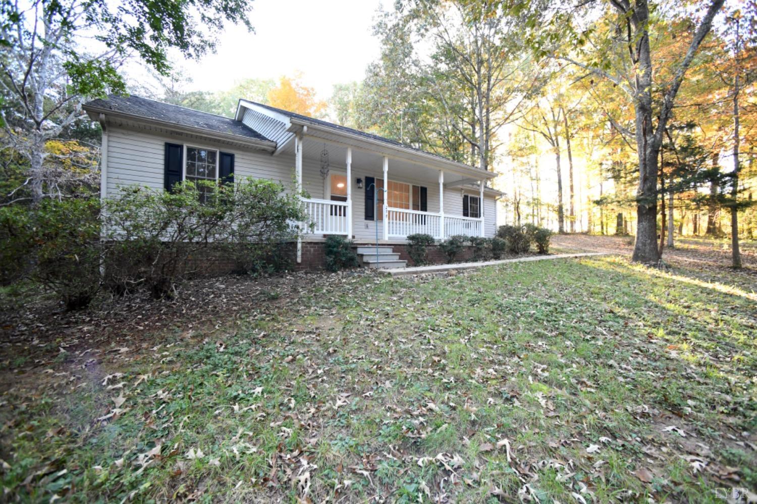 299 Sunset Ridge Drive Farmville, VA 23901 - Photo 15 of 38 a front view of a house with a yard and trees