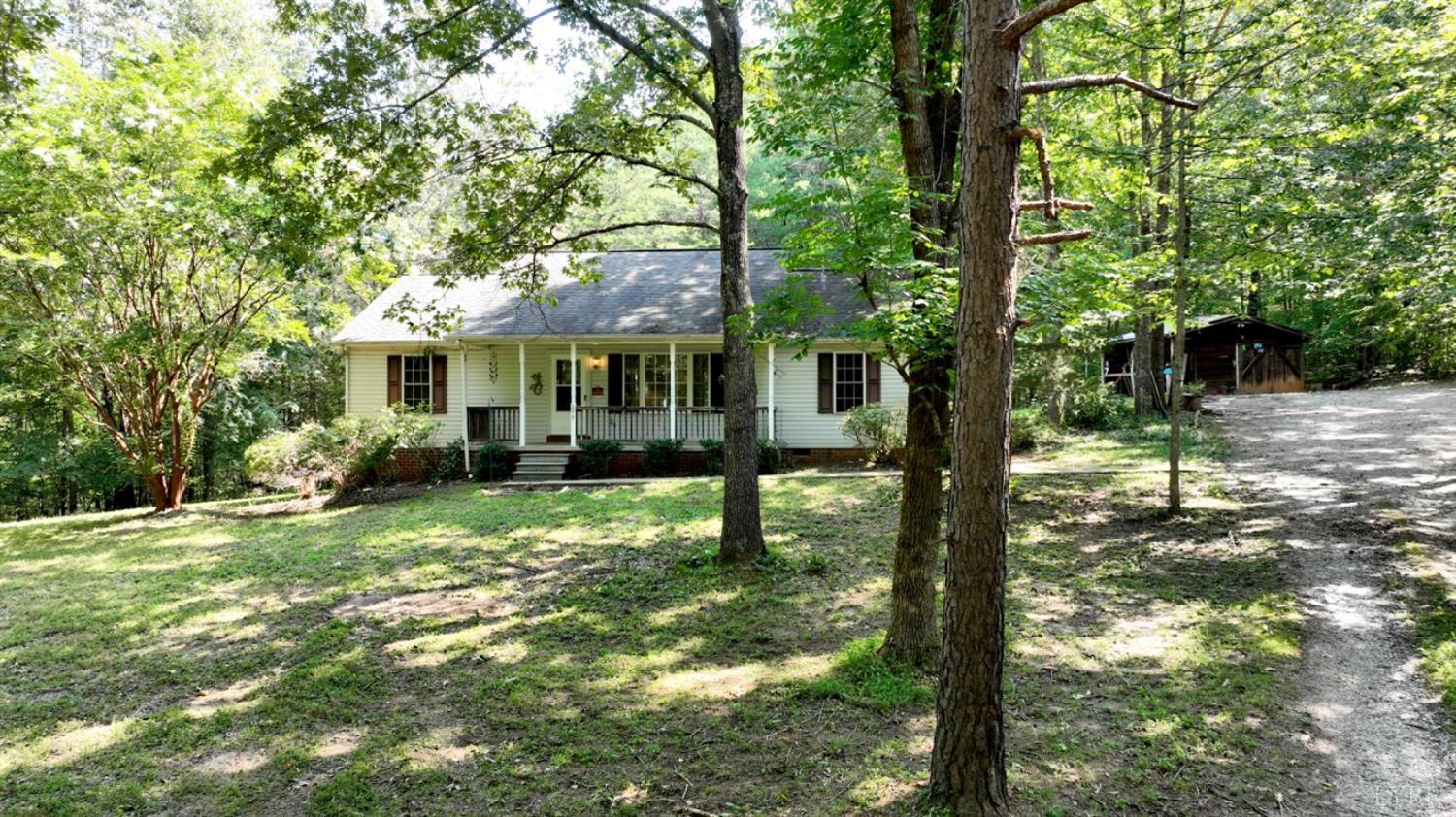 299 Sunset Ridge Drive Farmville, VA 23901 - Photo 2 of 38 a view of a house with backyard and a tree