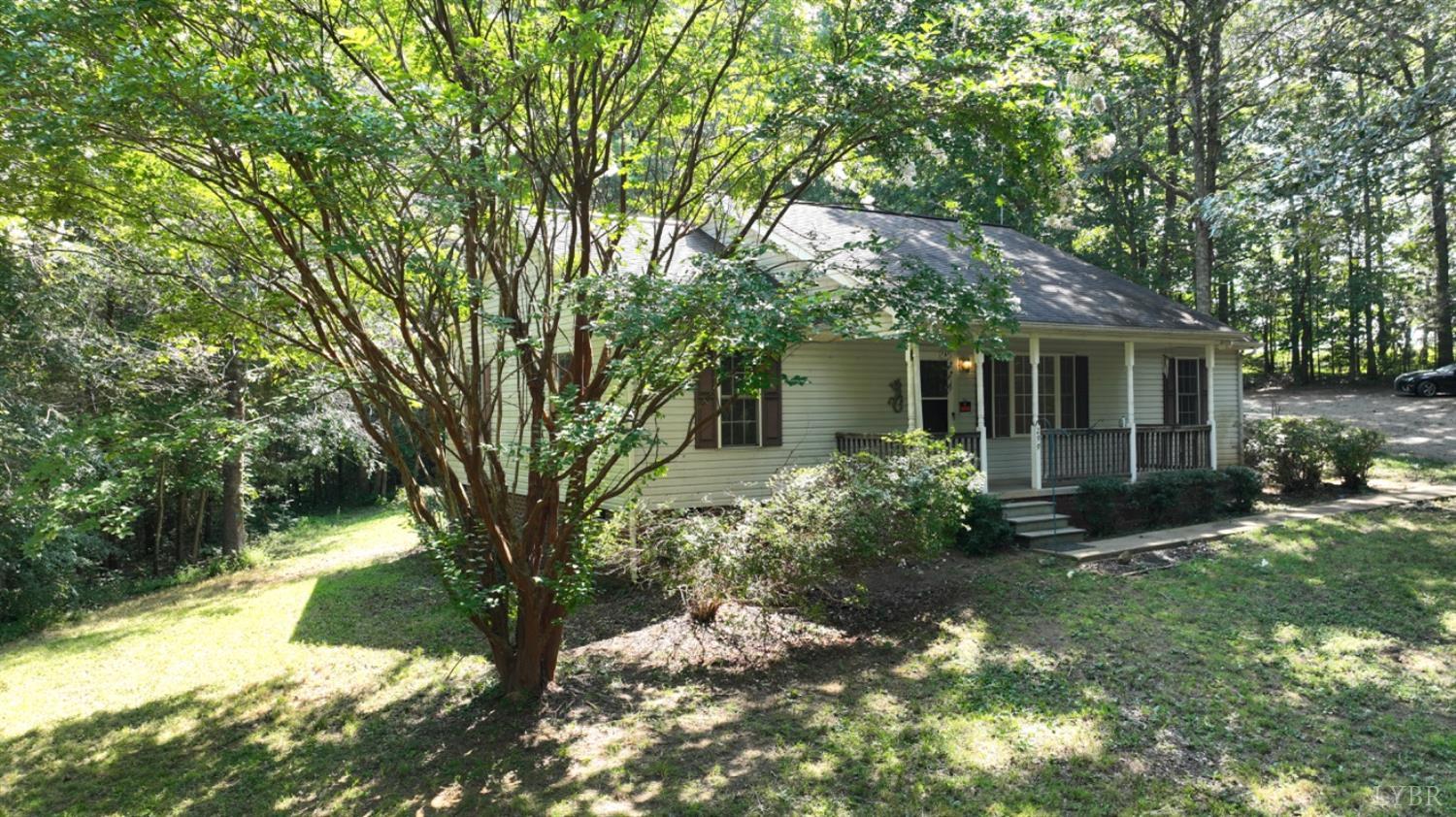 299 Sunset Ridge Drive Farmville, VA 23901 - Photo 4 of 38 a front view of a house with garden