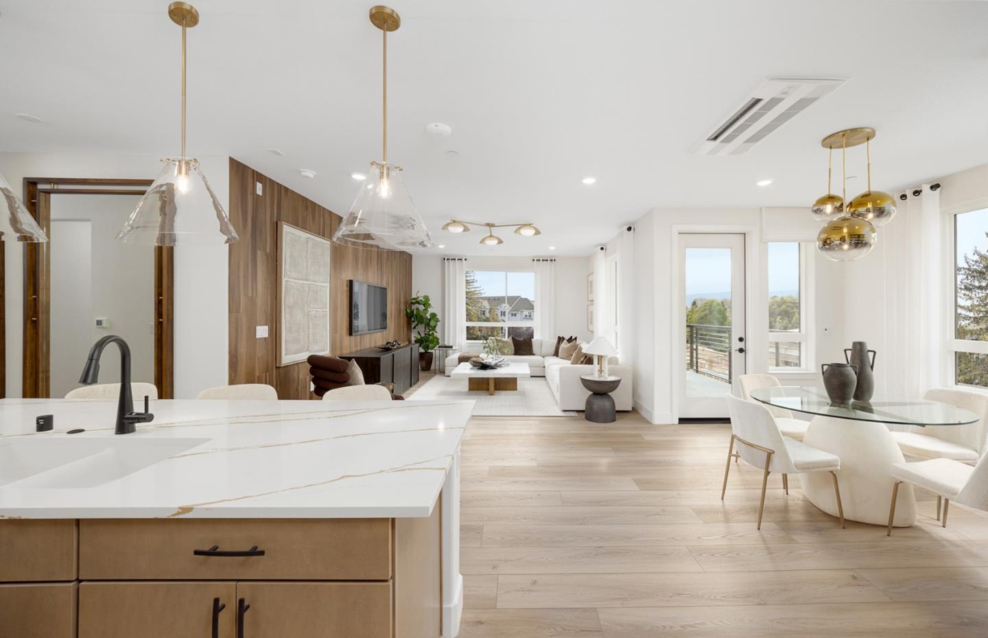 400 Tonkin Terrace, Unit 4 Sunnyvale, CA 94089 - Photo 11 of 17 a living room with kitchen island furniture and a chandelier