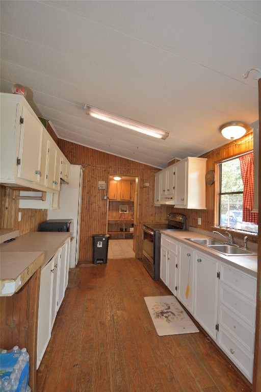 27119 Seahorse Lane Magnolia, TX 77355 - Photo 13 of 18 a large kitchen with stainless steel appliances kitchen island granite countertop a sink and cabinets
