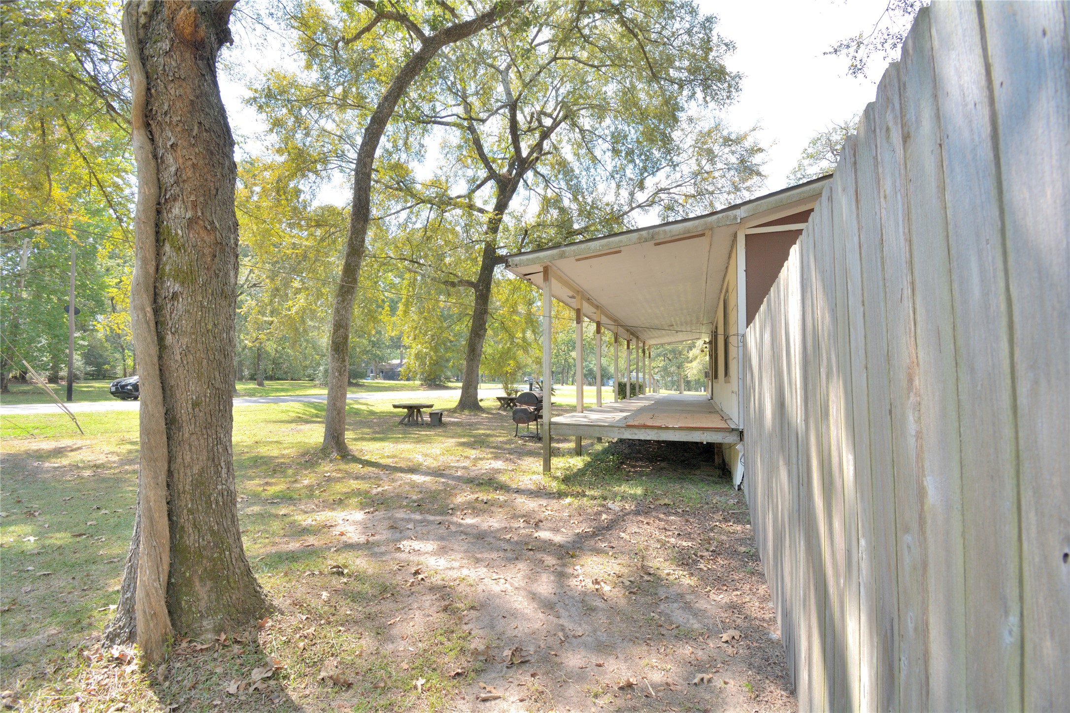 27119 Seahorse Lane Magnolia, TX 77355 - Photo 6 of 18 a view of a house with backyard and sitting area