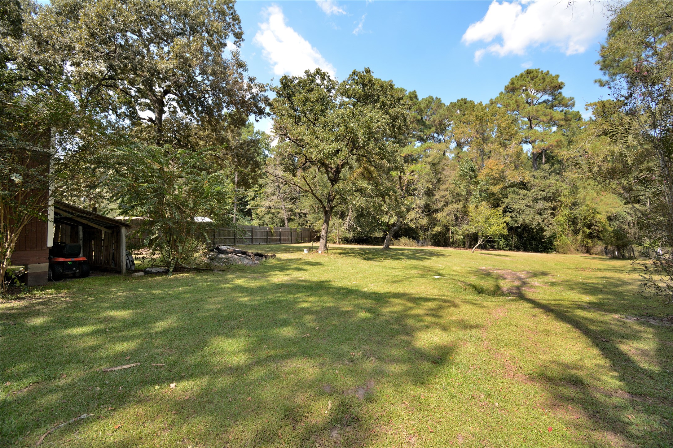 27119 Seahorse Lane Magnolia, TX 77355 - Photo 9 of 18 a view of yard with swimming pool and trees