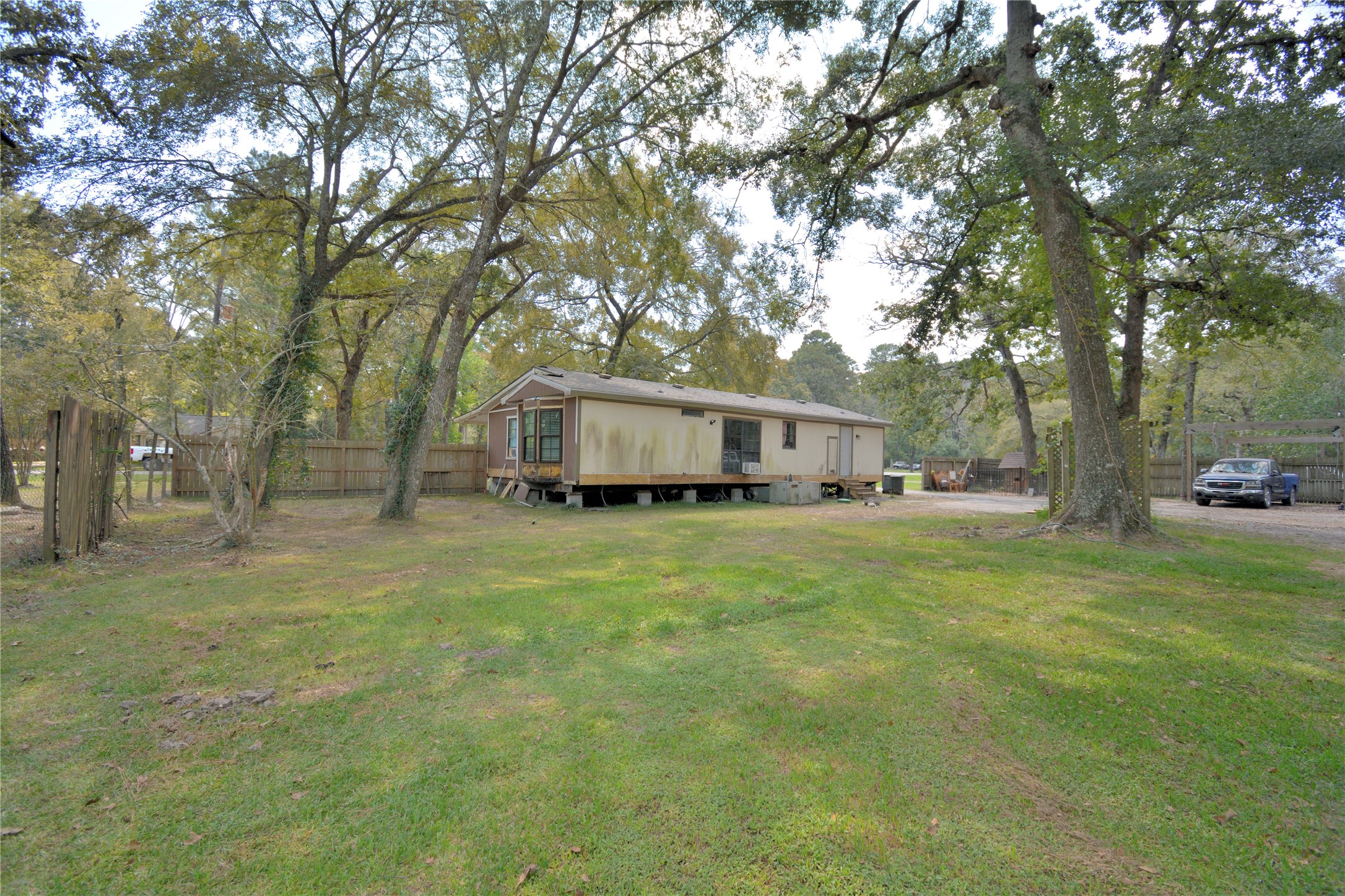 27119 Seahorse Lane Magnolia, TX 77355 - Photo 10 of 18 a front view of a house with a garden
