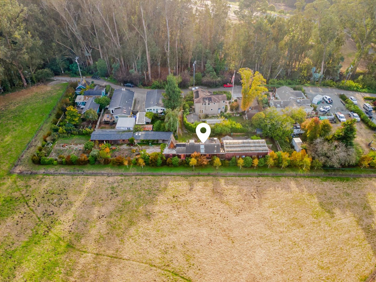 1009 Miramontes Street Half Moon Bay, CA 94019 - Photo 1 of 69 a view of a swimming pool with a yard