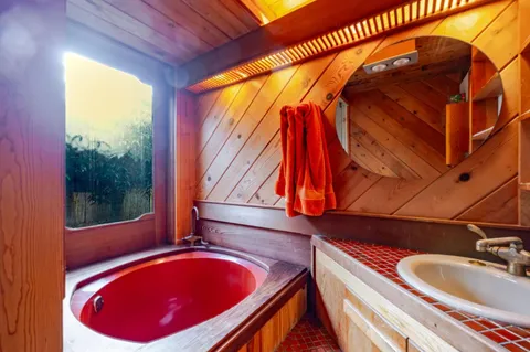 a room with fireplace and wooden floor