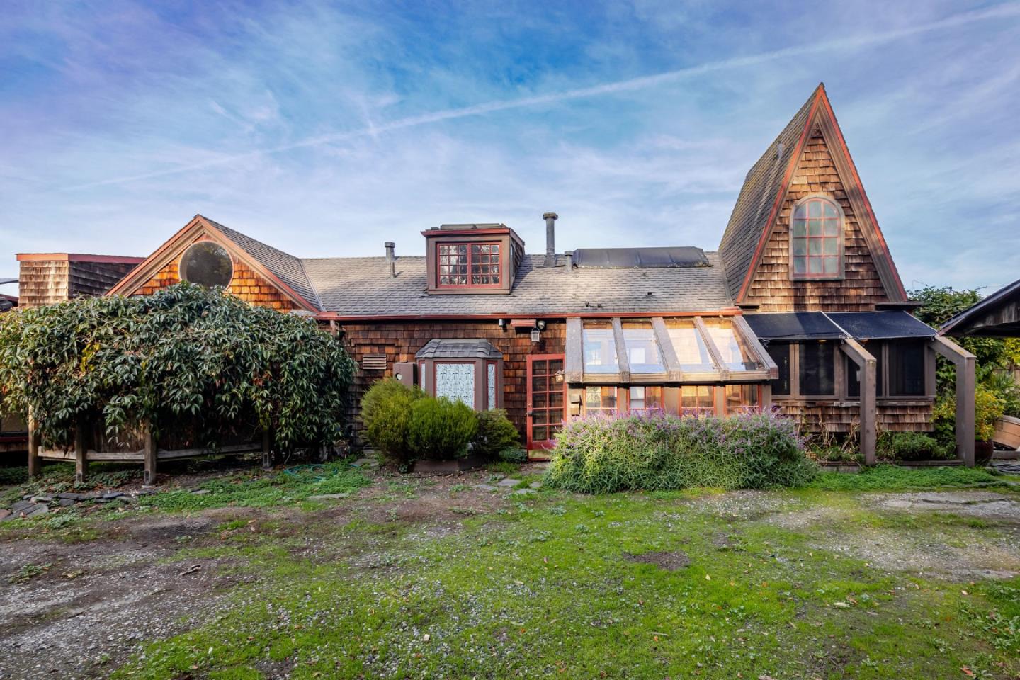 1009 Miramontes Street Half Moon Bay, CA 94019 - Photo 26 of 69 a front view of a house with garden