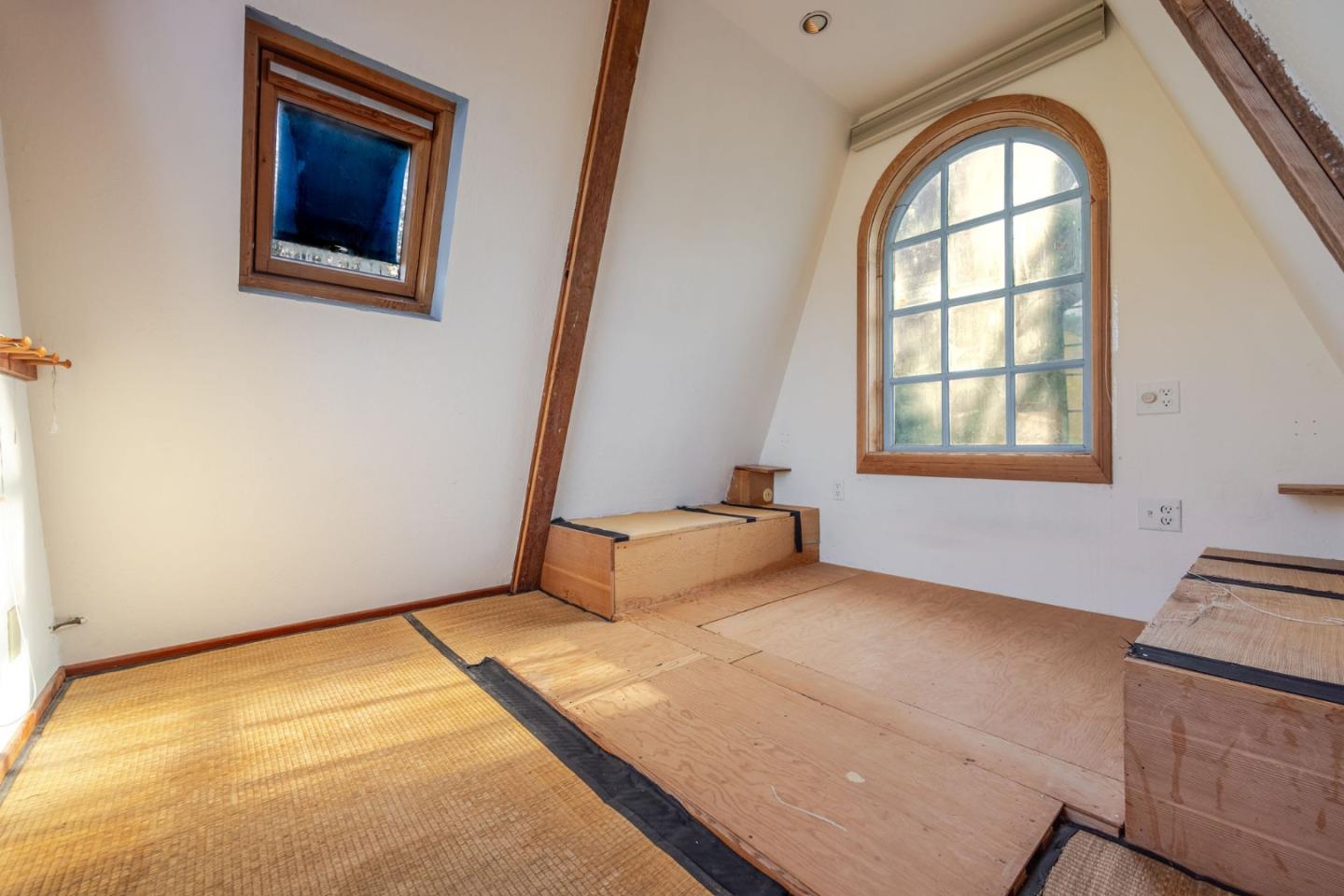 1009 Miramontes Street Half Moon Bay, CA 94019 - Photo 30 of 69 an empty room with windows