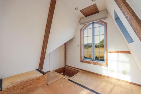a kitchen with a refrigerator and a stove