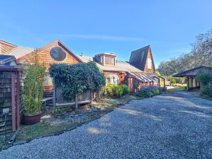a kitchen that has a sink and a stove