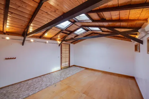 a view of hallway with a large window